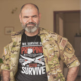 We Survive By Prepping - Tshirt